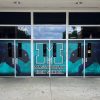 Massaponax High School entry doors wrapped with custom graphics installed by experienced graphic installers to highlight school pride.