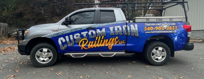 Updated vehicle wrap refreshed by a local print shop for Custom Iron Railings after ten years of use.