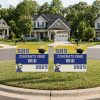 Custom graduation yard signs for Will displayed at the center of a neighborhood cul-de-sac with school colors, graduation cap graphic, and class year